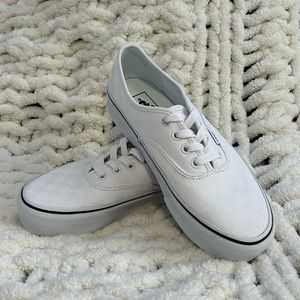Vans size 5 boys white shoes.